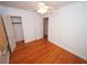 Inviting bedroom featuring gleaming hardwood floors, a ceiling fan, and closet at 1191 Beechview Se Dr, Atlanta, GA 30316