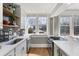 Bright modern kitchen with stainless steel appliances and grey subway tile backsplash at 301 10Th Ne St # 15, Atlanta, GA 30309