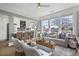 Bright living room featuring a modern kitchen with a view to the comfortable living room with natural light at 301 10Th Ne St # 15, Atlanta, GA 30309
