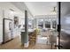 Inviting living space featuring a modern kitchen with a view to the living room with natural light at 301 10Th Ne St # 15, Atlanta, GA 30309