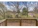 Enjoy the scenery from this home's backyard deck at 4288 Buford Valley Way, Buford, GA 30518