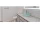 Bathroom with a glass vessel sink, LED mirror, and granite countertops at 4288 Buford Valley Way, Buford, GA 30518