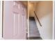 Inviting entryway with a staircase, showcasing a blend of modern design and cozy comfort for a welcoming ambiance at 4288 Buford Valley Way, Buford, GA 30518