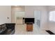 Spacious living area with a modern kitchenette and stylish furnishings at 4288 Buford Valley Way, Buford, GA 30518