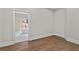 Bedroom hallway with a view of a luxurious bathroom with a soaking tub at 1066 Fairway Valley Dr, Woodstock, GA 30189