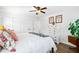 Cozy bedroom with wood floors, white walls, and ample closet space at 1405 Roper Rd, Canton, GA 30115
