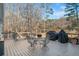 Spacious deck with wooded views, ideal for outdoor dining and entertaining at 1405 Roper Rd, Canton, GA 30115