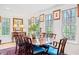 Elegant dining room with large windows and wood floors at 1405 Roper Rd, Canton, GA 30115
