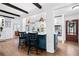Kitchen and breakfast bar with pendant lighting and stainless steel appliances at 1405 Roper Rd, Canton, GA 30115