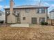 The house features a large backyard with a patio, privacy fence, and some landscaping at 2708 Stockbridge Way, Dacula, GA 30019