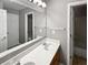 Bathroom with double vanity, large mirror, and good lighting at 2708 Stockbridge Way, Dacula, GA 30019