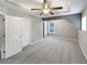 Cozy bedroom with ceiling fan, neutral colors and ample closet space at 2708 Stockbridge Way, Dacula, GA 30019