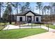 Community clubhouse featuring modern architecture, landscaping, and ramp access at 1733 Hyssop Blvd, Mableton, GA 30126