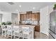 Modern kitchen with stainless steel appliances, a large island, and an open layout at 1733 Hyssop Blvd, Mableton, GA 30126