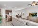 Open-concept living space with kitchen, dining area, and cozy seating arrangement at 1733 Hyssop Blvd, Mableton, GA 30126