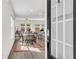 Inviting open-concept living space with natural light and hardwood floors throughout at 1733 Hyssop Blvd, Mableton, GA 30126