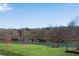 Scenic river view with picnic area and manicured lawn creates a relaxing outdoor space at 1733 Hyssop Blvd, Mableton, GA 30126