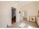 Bright hallway with doorways leading to other rooms, featuring light tile flooring at 1269 Monroe Drive Ne, Atlanta, GA 30306