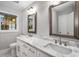 Elegant bathroom features double vanity with marble countertop and modern fixtures at 2026 Swazey Dr, Decatur, GA 30032