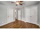 Bedroom with a ceiling fan, hardwood floors, and closet at 2026 Swazey Dr, Decatur, GA 30032