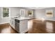 An open kitchen with a center island and stainless steel appliances at 2026 Swazey Dr, Decatur, GA 30032
