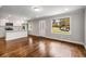 Bright open concept living area with hardwood floors, and an eat-in kitchen featuring stainless steel appliances at 2026 Swazey Dr, Decatur, GA 30032