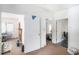 View of a hallway with multiple doorways leading to different rooms in the house at 207 Taylor Cir, Palmetto, GA 30268