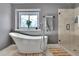 Bathroom featuring soaking tub, shower, tile floor and a window at 340 Willow Crescent Way, Johns Creek, GA 30022
