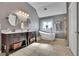 Bathroom featuring double vanities, soaking tub, and tile floors at 340 Willow Crescent Way, Johns Creek, GA 30022