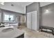 Stylish bathroom featuring a soaking tub, double vanity, walk-in shower and elegant modern finishes at 340 Willow Crescent Way, Johns Creek, GA 30022
