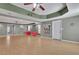Bright living room with a trey ceiling, hardwood floors and neutral paint at 340 Willow Crescent Way, Johns Creek, GA 30022