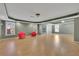 Spacious living room featuring hardwood floors, ample lighting and large windows at 340 Willow Crescent Way, Johns Creek, GA 30022