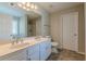 Bathroom featuring double sinks, a shower, natural light and neutral walls at 4310 Alysheba Dr, Fairburn, GA 30213