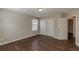 Bedroom with hardwood flooring, closet, and a window at 4310 Alysheba Dr, Fairburn, GA 30213