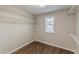 Walk-in closet with shelving and a window at 4310 Alysheba Dr, Fairburn, GA 30213