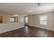 Hallway featuring hardwood floors, neutral walls, natural light and access to other rooms at 4310 Alysheba Dr, Fairburn, GA 30213