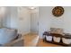 Cozy entryway with bench, storage, and view into the spacious living area at 923 Wexford Way, Auburn, GA 30011