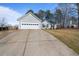 Charming single-story home features a two-car garage and manicured landscaping at 923 Wexford Way, Auburn, GA 30011
