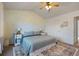 A comfortable main bedroom features a king-size bed, large windows, and ample space for relaxation at 923 Wexford Way, Auburn, GA 30011