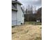 Side view of a house's backyard with a storage shed at 1630 Stonehaven, Cumming, GA 30040