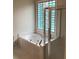 Bathroom features a glass enclosed shower and decorative window above a tub at 1630 Stonehaven, Cumming, GA 30040