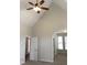 Vaulted bedroom features carpet, ceiling fan, neutral colors, and arched doorway at 1630 Stonehaven, Cumming, GA 30040