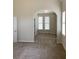 Large bedroom featuring arched doorway and large window at 1630 Stonehaven, Cumming, GA 30040