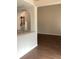 Bright living room featuring new hardwood floors and neutral wall colors at 1630 Stonehaven, Cumming, GA 30040