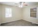 Bedroom showcasing ceiling fan and natural light coming through windows at 1826 Meadowglades Dr, Decatur, GA 30035