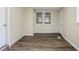 Bright bedroom with hardwood flooring, natural light, and neutral walls at 1826 Meadowglades Dr, Decatur, GA 30035