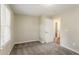 Bedroom with standard door and window with natural light at 1826 Meadowglades Dr, Decatur, GA 30035