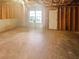 Unfinished basement providing ample storage space, or opportunity for additional renovations at 1997 Alcovy Trace Way, Lawrenceville, GA 30045