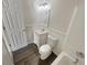 Cozy bathroom with tub, toilet and sink at 1997 Alcovy Trace Way, Lawrenceville, GA 30045