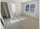 Bedroom featuring a window and closet at 1997 Alcovy Trace Way, Lawrenceville, GA 30045